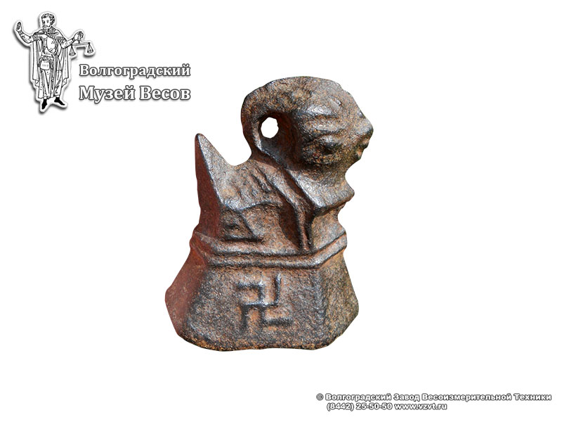 Cast-iron weight in the form of a mythical being. China, pres. 18th - 19th centuries.