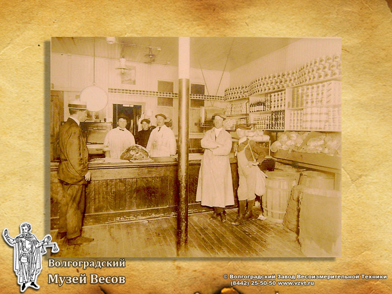 Interior of the shop. Old-time photograph depicting scales.