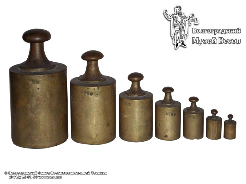 Set of copper cylindrical weights with verification marking. Europe, 20th century