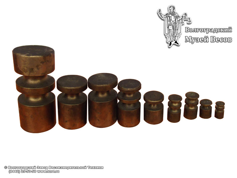 Copper trade weights of cylindrical shape. England, the first half of 20th century