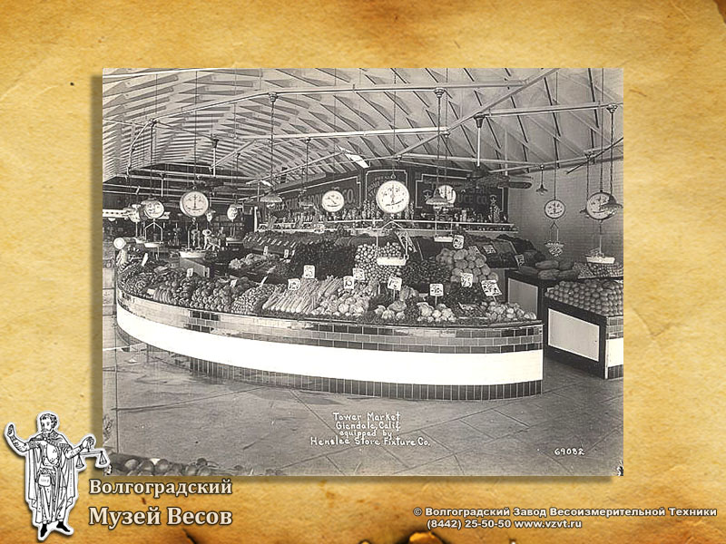 City market. A postcard with the picture of scales.