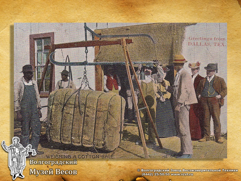 Weighing of a bale of cotton. Postcard with the picture of scales.