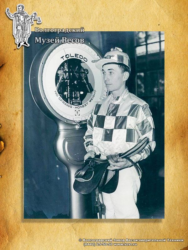 Weighing of jockey on Toledo scales. Retro photo.