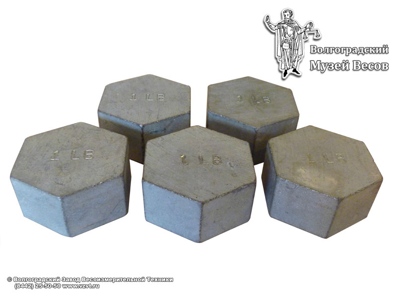 Hexagon shape weights of 1 pound nominal value. Presum. England, 20th century