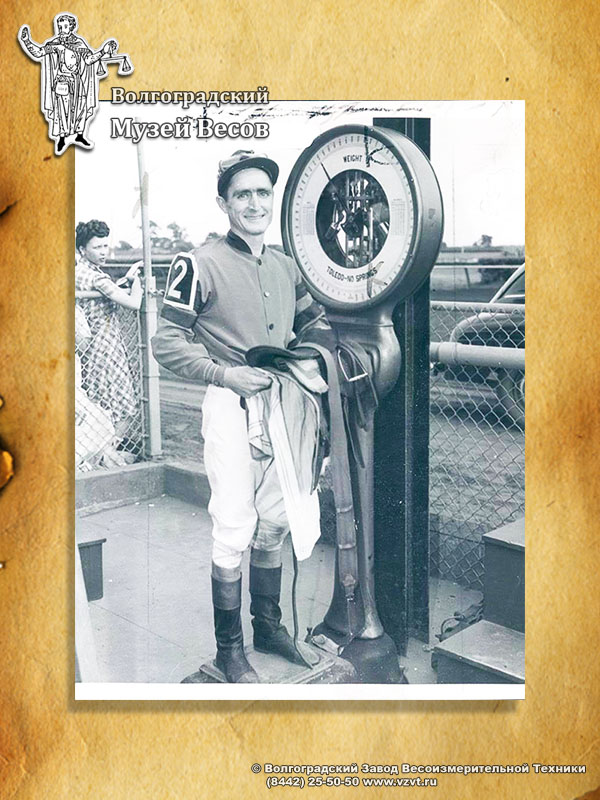 Weighing of a jockey on Toledo scales. Retro photo.