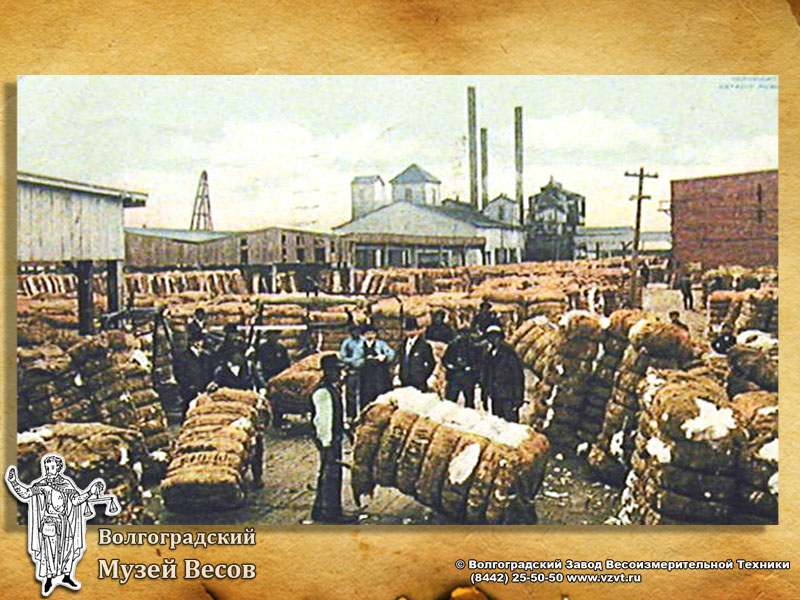 Weighing of cotton. A vintage postcard with the picture of scales.
