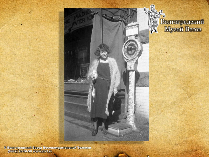 Retro photo depicting street scales for personal weighing.