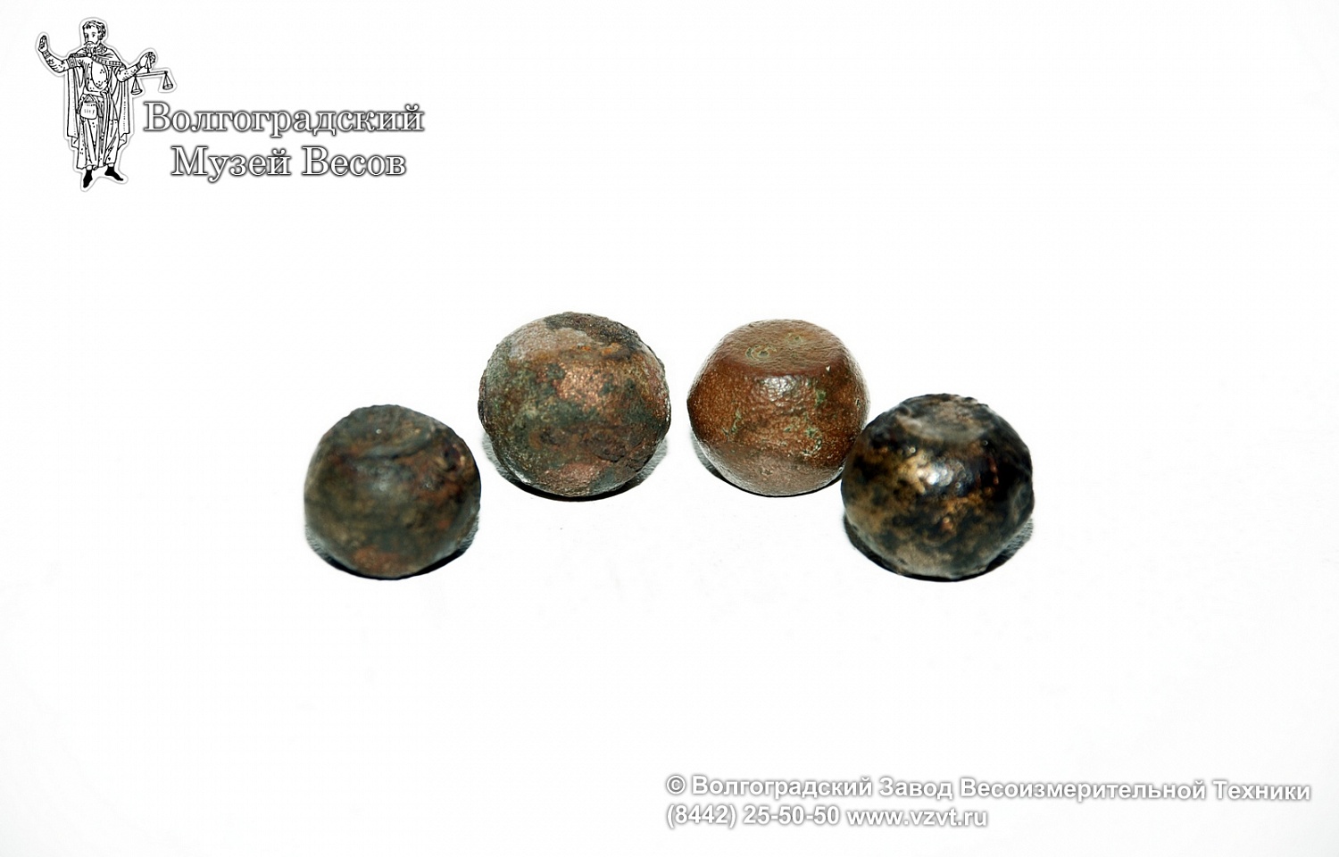 Iron weights in a bronze case-shell with a nominal value of 4 zolotniks. Russia, the 12th – 16th centuries.