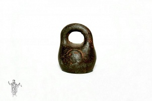 "Eighth of a pound" cast iron weight 